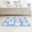 White Flower with Blue Ground Bath Mat
