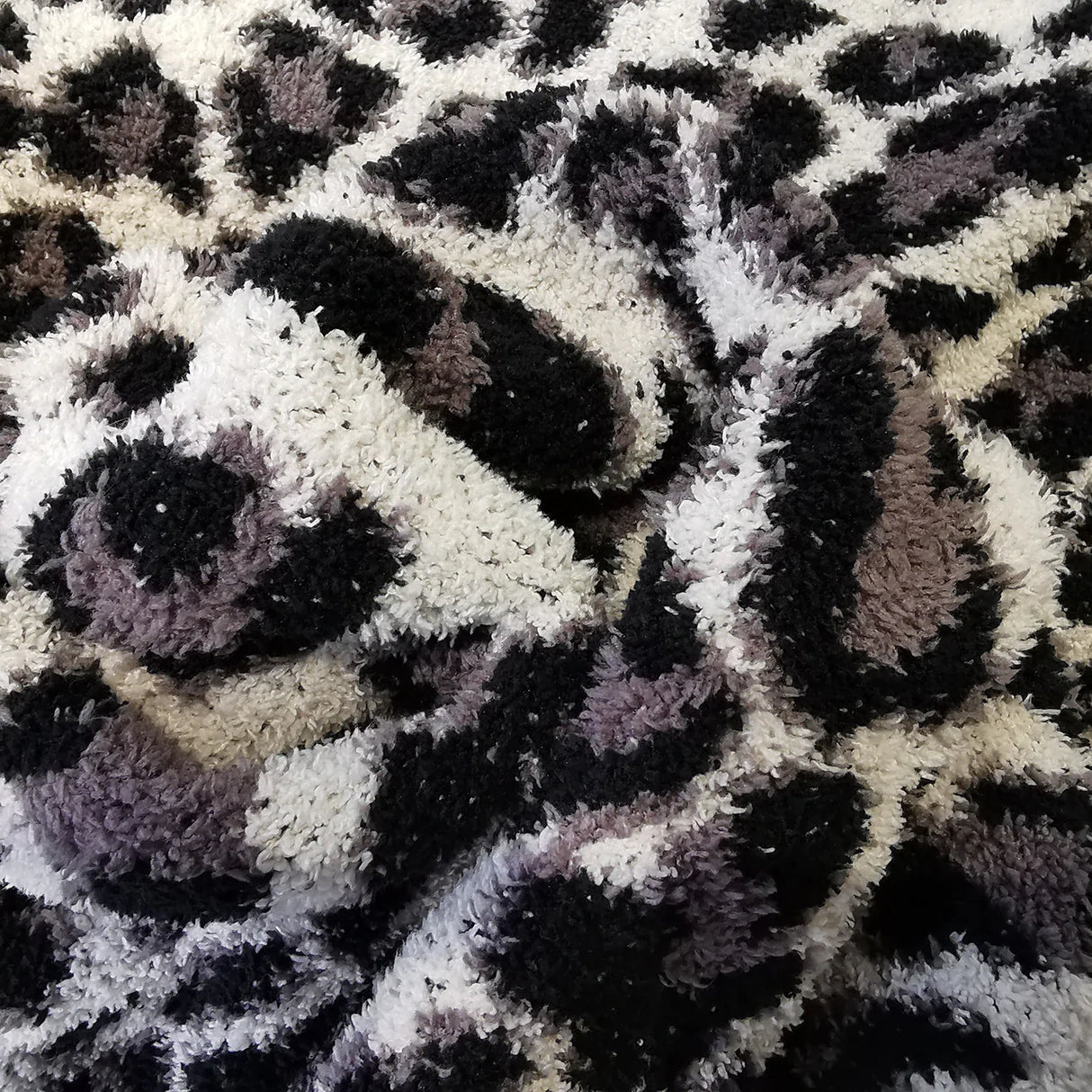 The Luxe Redux Leopard Throw Blanket