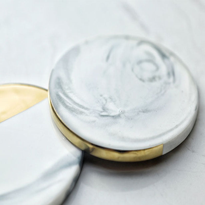 Set of Four Marble and Gold Colored Geometric Coasters