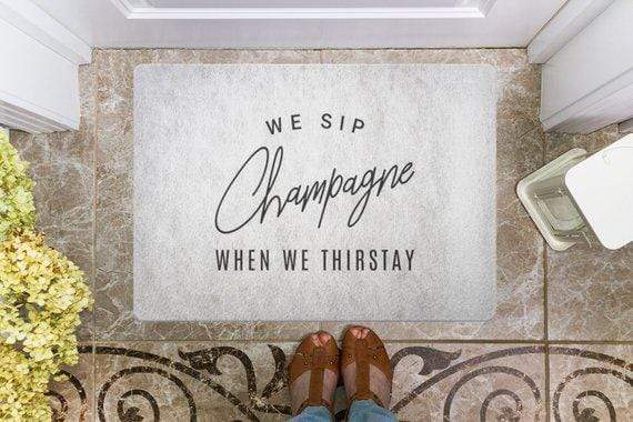 We Sip Champagne When We Thirstay Doormat