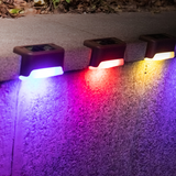 4-Pack Solar-Powered LED Fence Wall Lights for Outdoor Garden Pathways and Decks