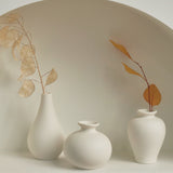 White Ceramic Curve Vase Set (5 vases)