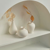 White Ceramic Curve Vase Set (5 vases)