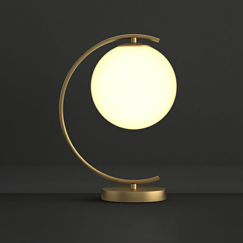 Ball Cream Glass Table Lighting Postmodern Single-Bulb Night Lamp with Curved Arm in Gold