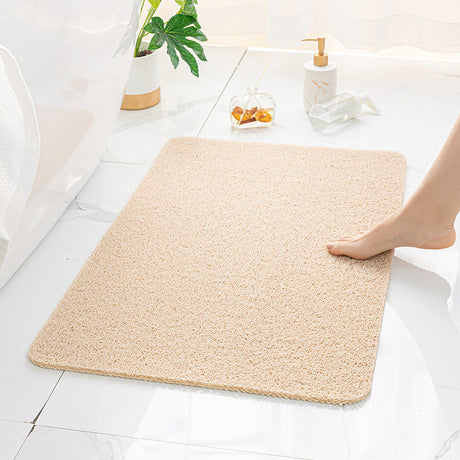 cream bathroom mat