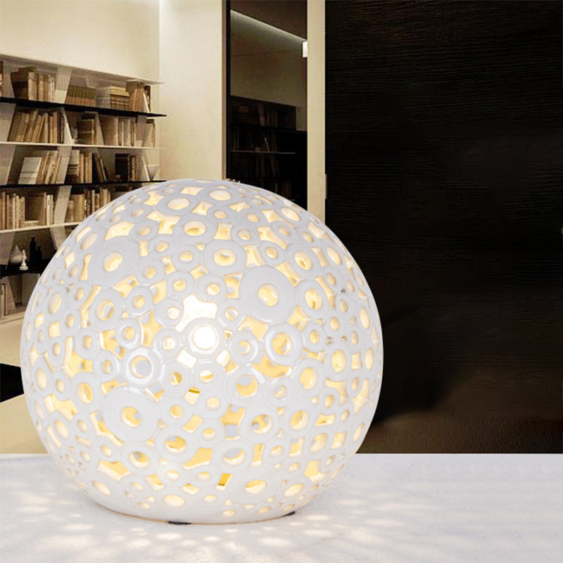 White Hollow-Out Globe Table Light Modernism 1-Head Ceramics Night Lamp for Bedroom