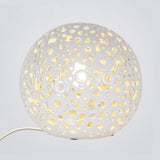 White Hollow-Out Globe Table Light Modernism 1-Head Ceramics Night Lamp for Bedroom