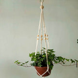 Handmade macrame plant flower pot hanger for wall decoration