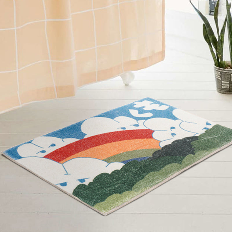 Rainbows and clouds bath mat