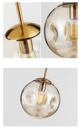 Aminta Dimpled Glass Shade Brass Pendant Light