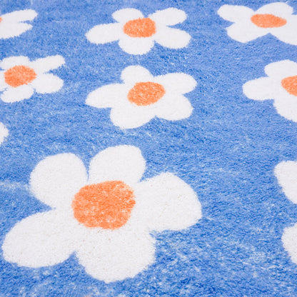 White Flower with Blue Ground Bath Mat
