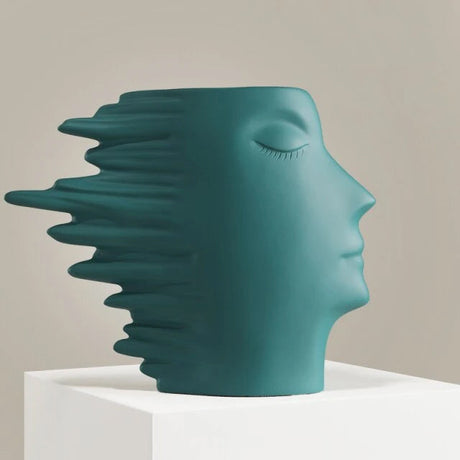 Faces in the Wind Vase