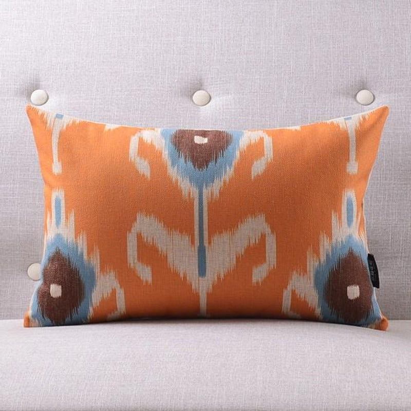 The Clementine + Teal Ikat Pillow Cover Collection