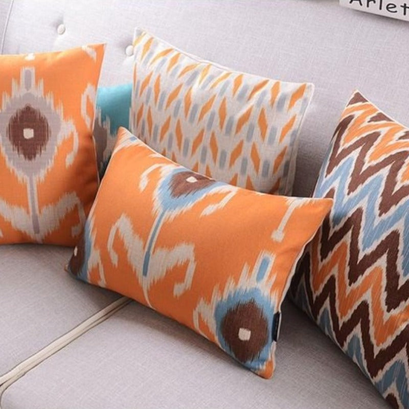 The Clementine + Teal Ikat Pillow Cover Collection