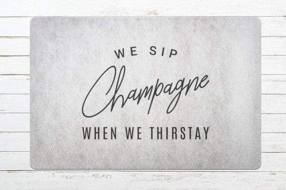 We Sip Champagne When We Thirstay Doormat